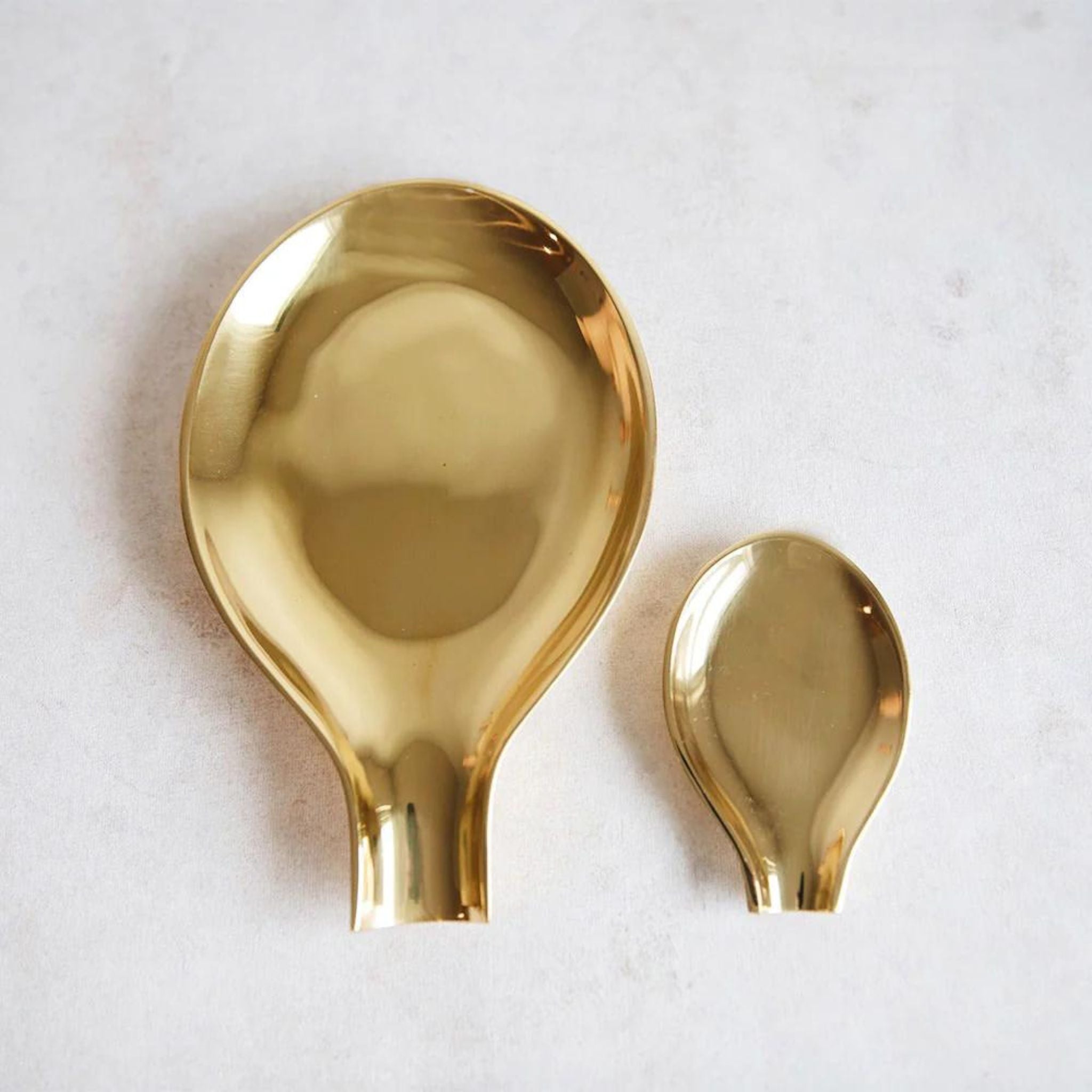 Simply Elevated - Ingenuous yet super simple, this Brass Spoon Rest provides a place to put your spoon when not in use. Perfect for keeping on the counter while cooking, or giving to guests when Serving tea, the Brass Spoon Rest is the perfect accompaniment for any oft-used stove-side utensil.