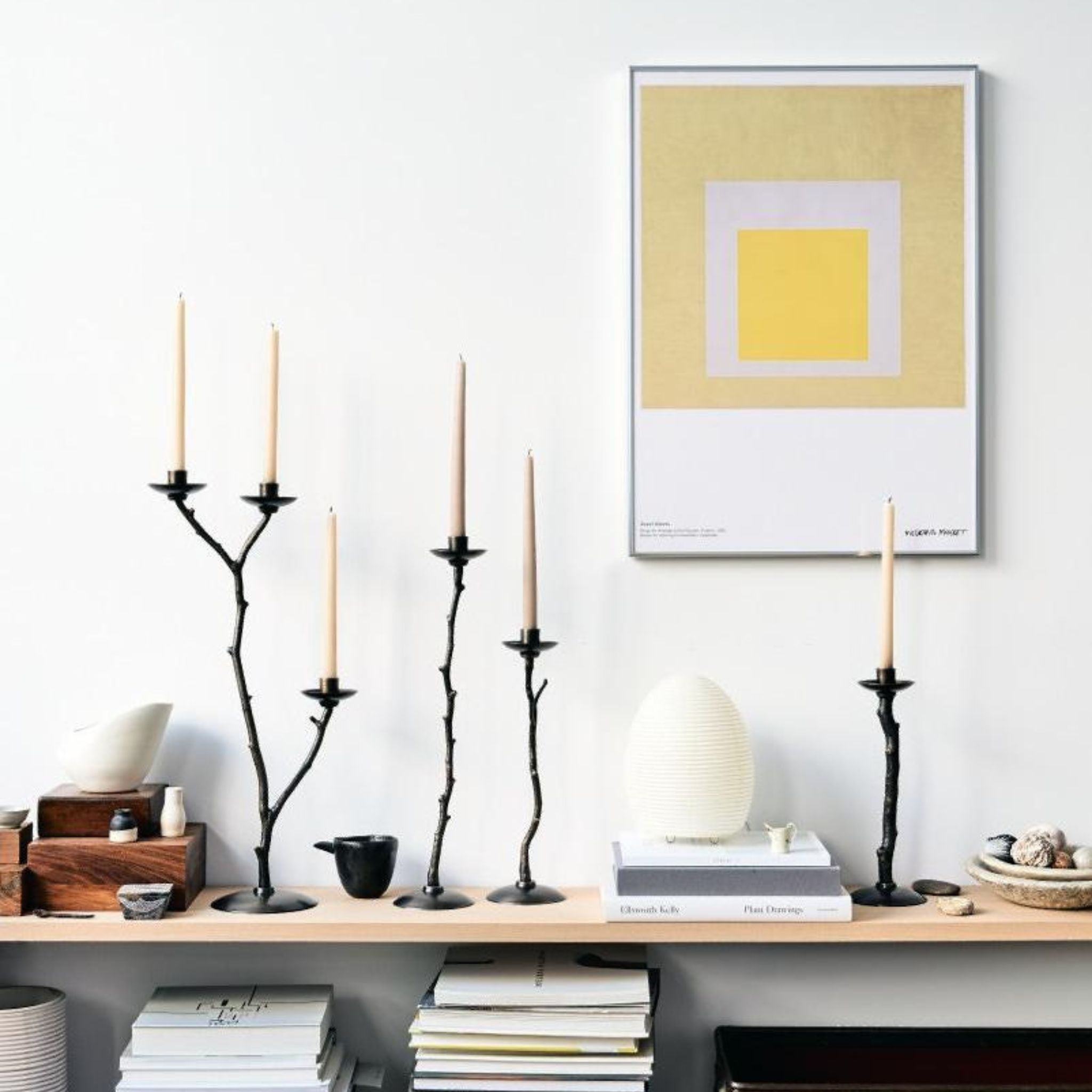 Simply Elevated - Returning always to the natural world, candlesticks have stems based on found branches and twigs. All are distinctive shapes, purposefully selected for their individual beauty, and, for their interest together as a sculptural set.