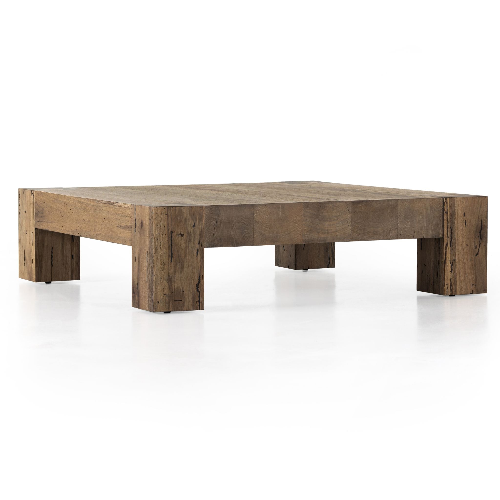 Simply Elevated - Elevate your living space with our Abaso Coffee Table. A captivating piece constructed from thick oak veneer, and chunky squared legs beautifully mimics the charm of wormwood, adding character and warmth to any room. 