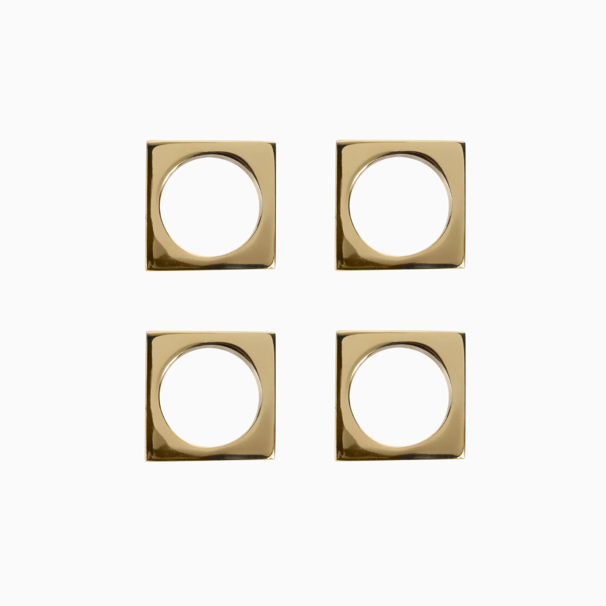 Simply Elevated - Brass Napkin Rings - A circle in a square, these weighty solid metal napkin rings embody geometric simplicity at its very best. Sold in pairs of two, they are available in either solid brass, or silver-plated brass.