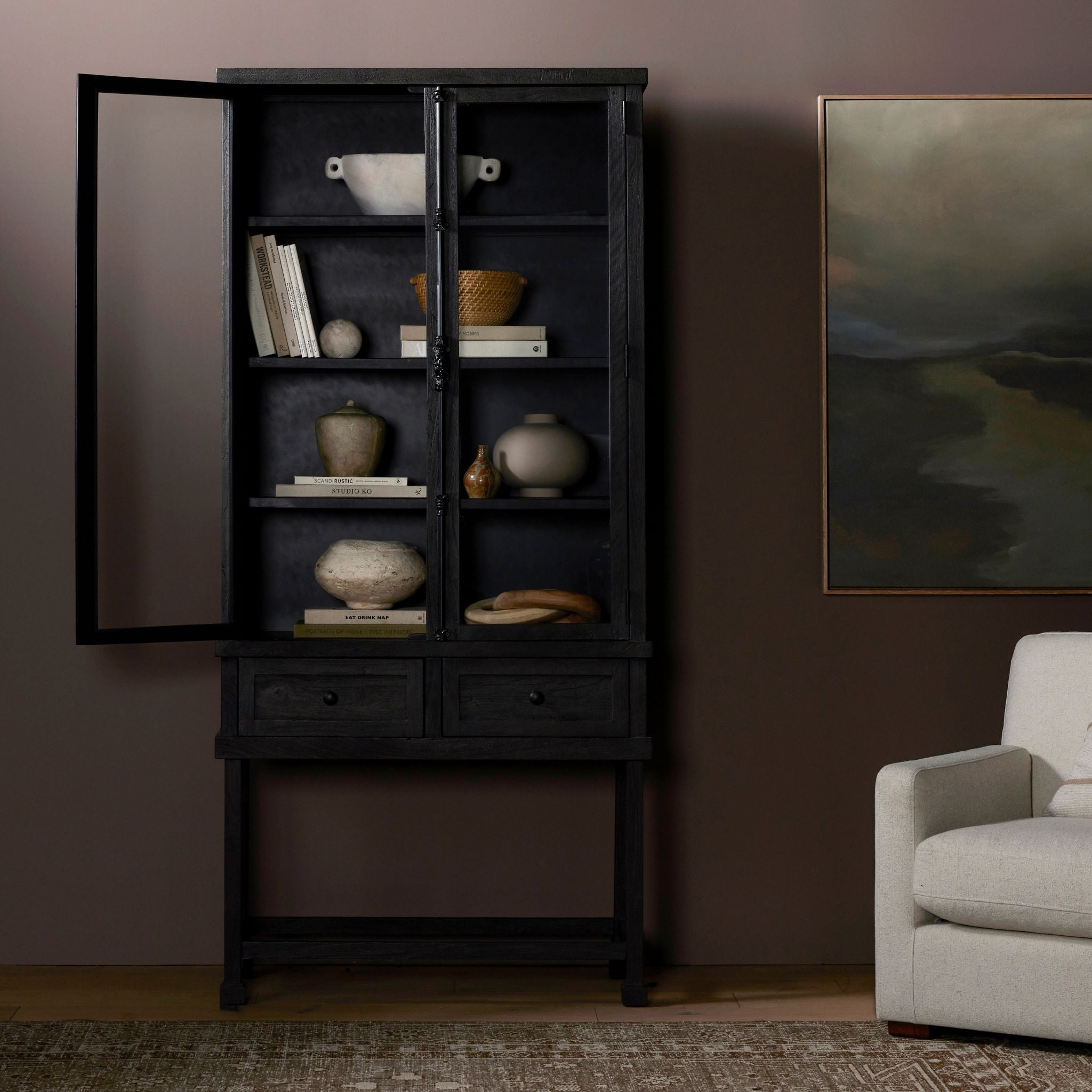 Simply Elevated - Solid reclaimed woods are finished in a deep coal-black, with crémone hardware for a classic touch. Tempered glass doors plus dual drawers for bonus storage.