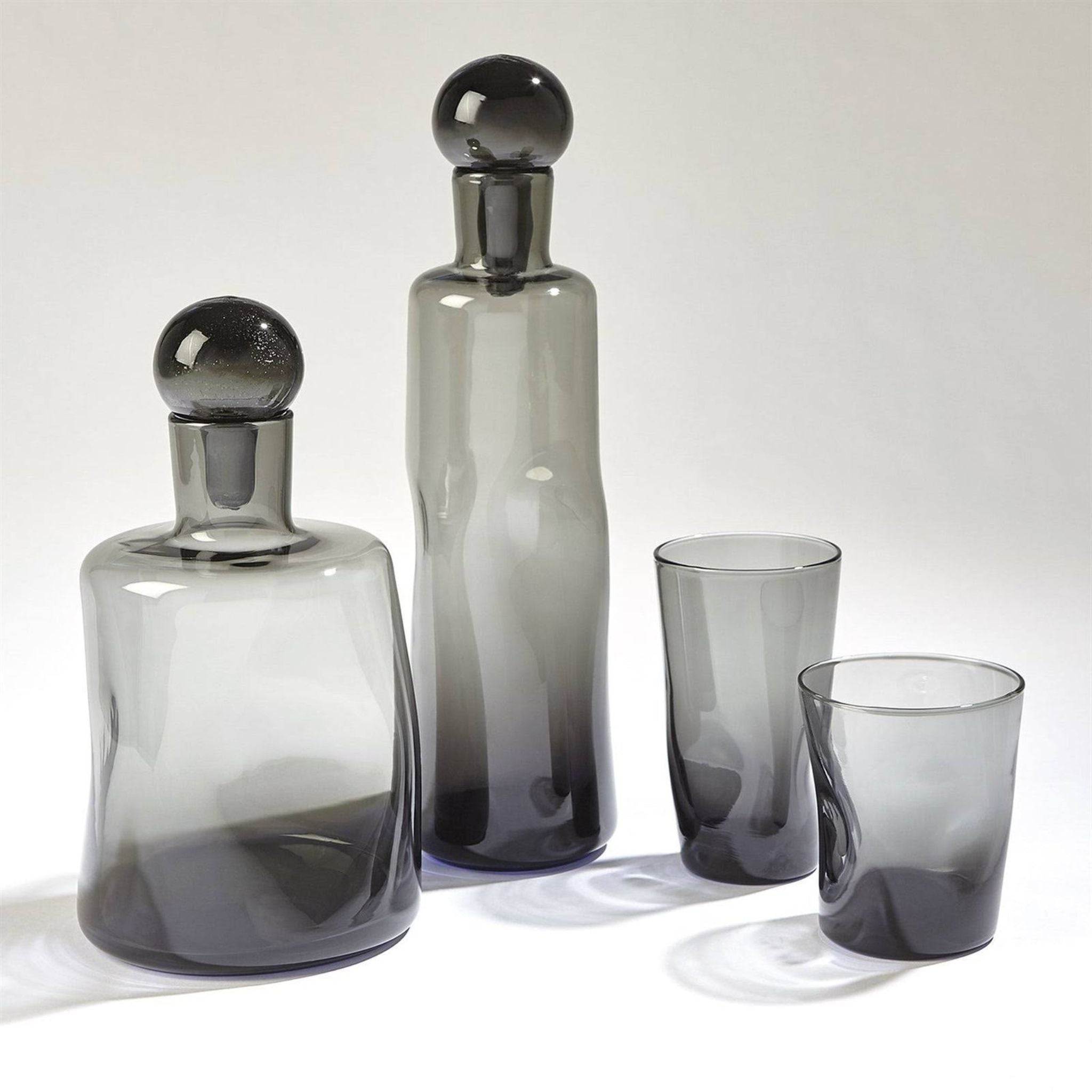 Simply Elevated - The pinched collection is mouth-blown Italian glassware with pinched detail